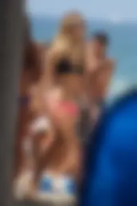 Beach volleyball babe with a nice ass in pink bikini bottom