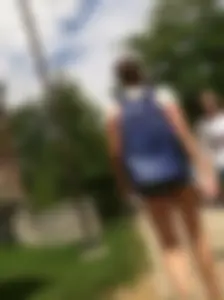 Hot college girl in little jean shorts showing some cheeks and legs