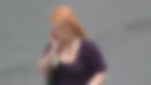 Redhead chick with some nice cleavage and bouncy tits