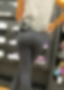 Shoe store employee with a sexy bubble butt in leggings
