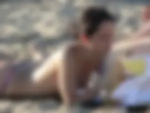 Sexy girls going topless at the beach showing off their sexy bodies