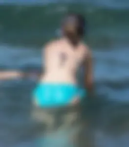 Another sexy girl on the beach snorkeling