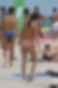 Beach voyeur girls in bikinis, thongs and topless