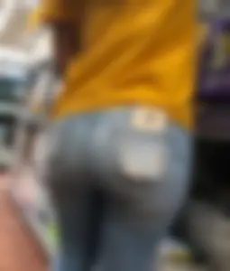 Hot brunette babe in tight jeans with a big booty and vpl