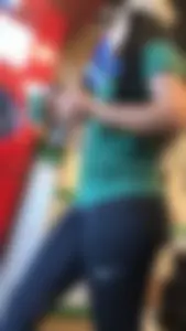 Latina in Nike leggings at the wing shop