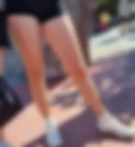 Candid teen's hot legs on the street, mini shorts creepshot