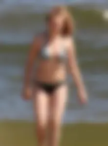 Two sexy beach teens in bikinis, one thick and one skinny with big boobs