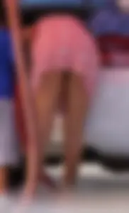 Sexy blonde upskirted in pink dress while cleaning her car