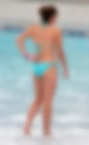 Cute girl with nice body in her teal bikini in Florida