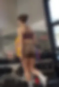 Hot girl in tight shorts bending