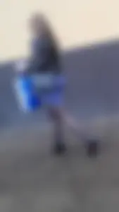 Hot girl wearing a skirt, leather jacket and black pantyhose street creepshot - hot skinny legs