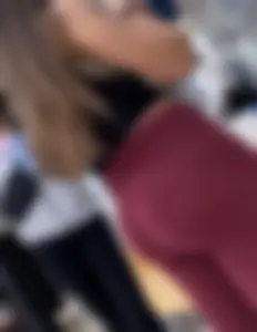 Cute chick in maroon leggings