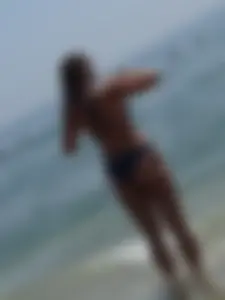 Beach girl with a nice ass and tits in blue bikini