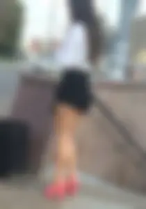 Muscular Legs in Shorts on Pink High Heeled Shoes Street Creepshot