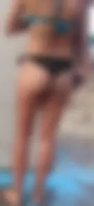 Beach shower milf in semi thong bikini with a nice ass
