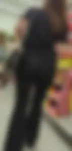 Brunette babe in black flares