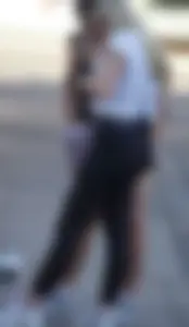 Thick blonde with big booty in Nike leggings showing vtl