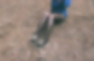 Teen JB in Pantyhose Sitting on the Ground in the Woods Candid