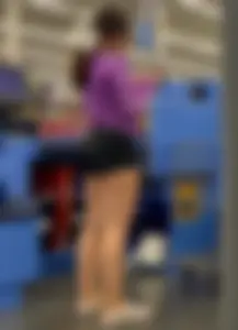 Bespectacled teen hottie in spandex shorts at the grocery store