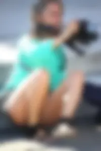 Blonde lady upskirted showing her panties and pussy lips