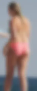 Thick blonde bikini babe on the beach