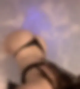 Girl in Sexy Lacey Lingerie Making Selfies in Bathtub