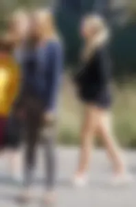 Skinny Arizona State University blonde college girl in grey leggings