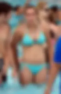 Cute girl with nice body in her teal bikini in Florida