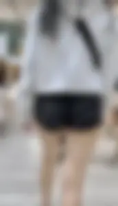 Asian girl in tight black shorts at the mall