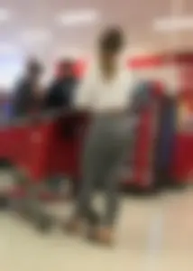 Sexy lady shopping at Target with a big ass in grey leggings