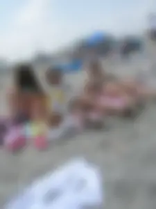 Stalking the busty girl on the beach