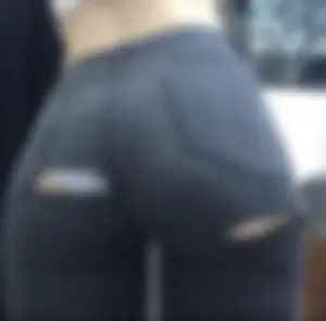 Hot Ass Closeup in Black Tight Torn Jeans With Panties Visible