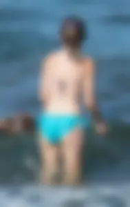 Another sexy girl on the beach snorkeling