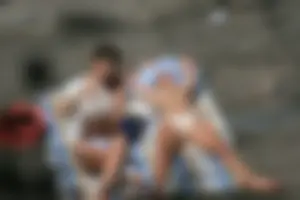 Two teens stripping and going topless to tan