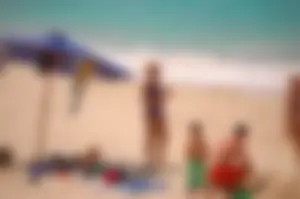 Assortment of sexy babes at the beach in bikinis