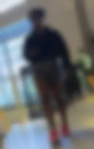 Nike employee in grey shorts with a massive wedgie
