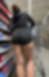 Latina with slight VPL in shorts- OC