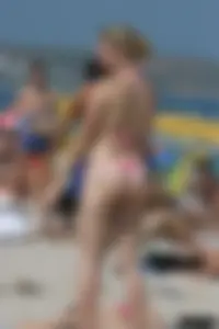 Beach voyeur girls in bikinis, thongs and topless