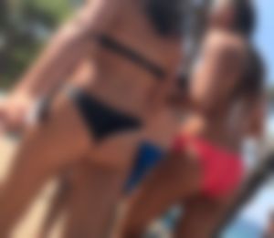 Hot Bikini Teens walking along the beach