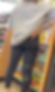 Leg brace girl shows round butt