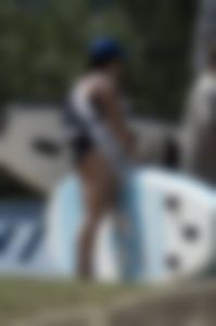 Great ass on bikini bottomed surfer girl