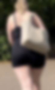 Thick ass in black bodysuit