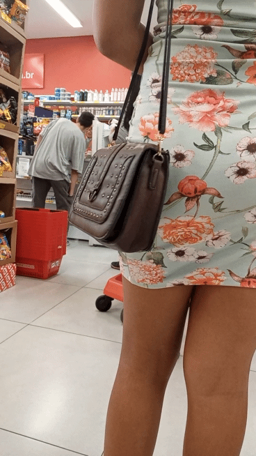Hot skinny girl in flowered skirt