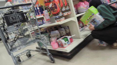Hijab Princess stocking shelves @ department store