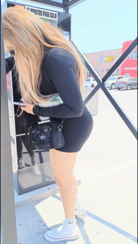Bending in black yoga shorts