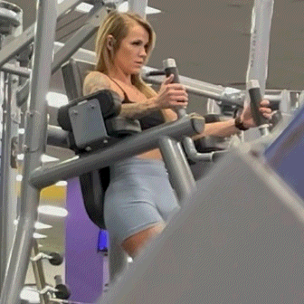 Petite blonde with bubble butt in blue spandex shorts