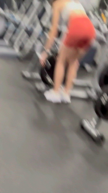 Beautiful girl bending over and spreading legs