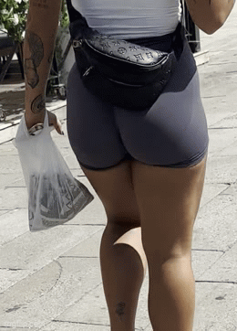Well-trained blonde with strong legs and juicy ass in spandex shorts