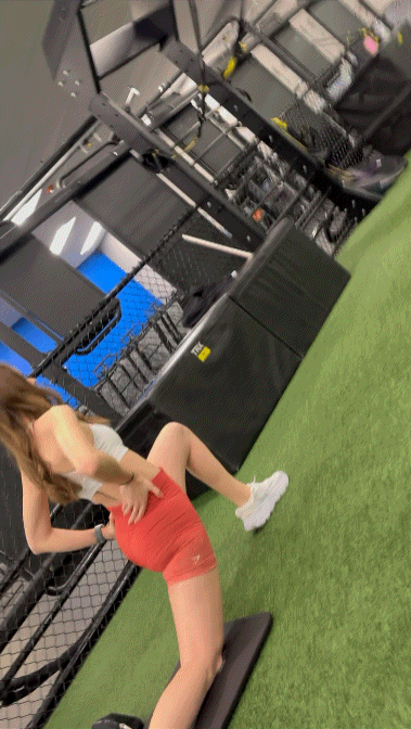 Beautiful girl bending over and spreading legs