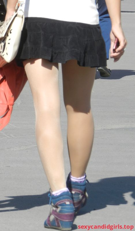 Sexycandidgirls Top Girl In A Short Skirt And Pantyhose Walking Down The City Street Item 1